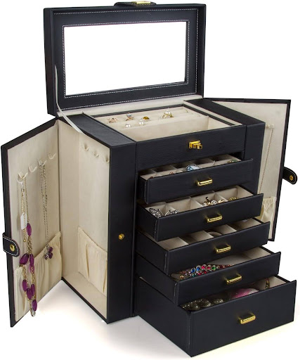 A black leather jewelry box with a top lid, 5 removable drawers, and 2 swing out cabinets