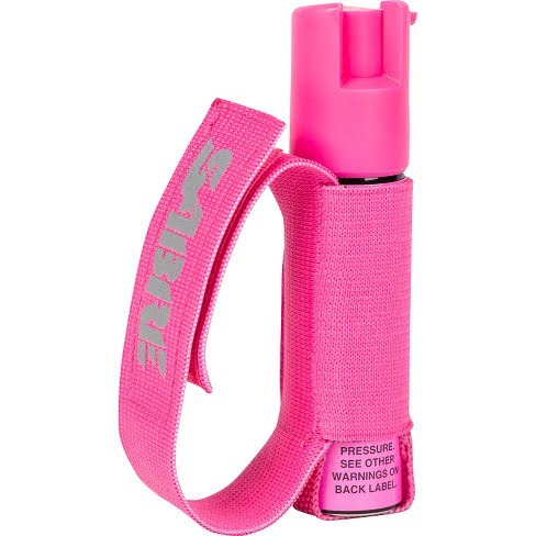 A pink portable pepper gel with an adjustable hand strap